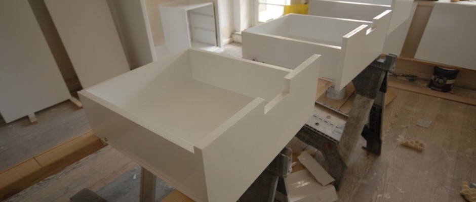 The drawers have been painted and will slot into the right-hand cupboard