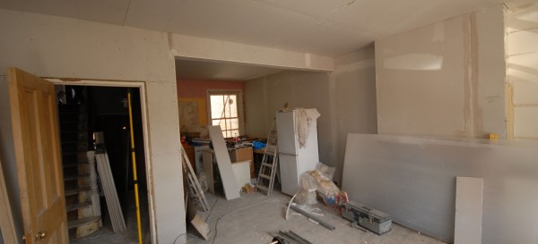 The kitchen / living room area - which has been plaster boarded out