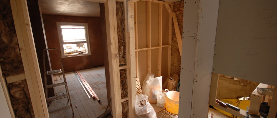 Plaster boarding and insulating the internal walls