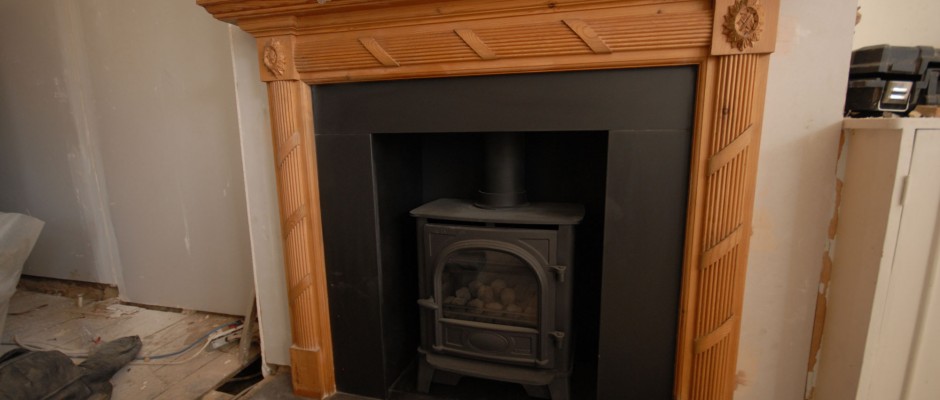 New gas stove in the living room area