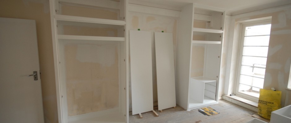 Half-way through building the bespoke MDF cupboards...