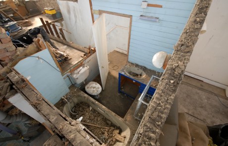 Looking down into the old bathroom - roof has been completely removed