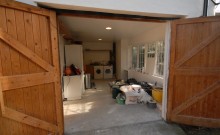 We used some of the old kitchen units and fitted them inside the garage to create a utility room
