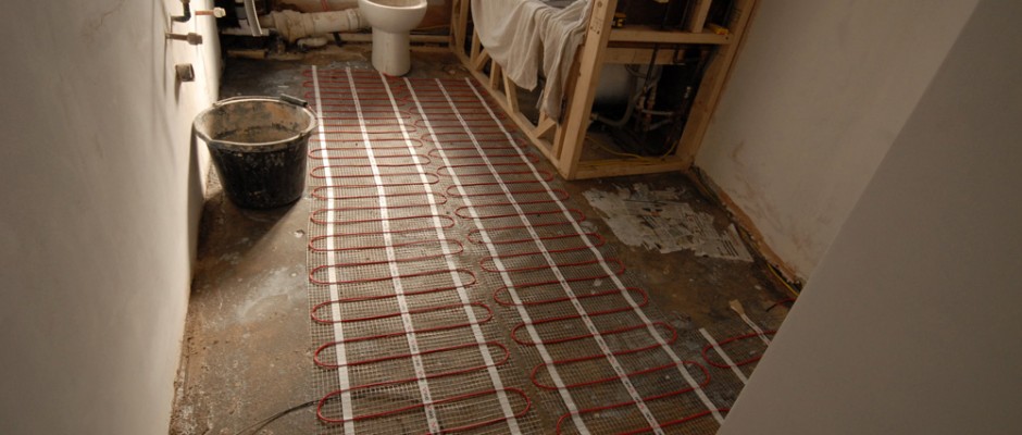 The underfloor heating in the bathroom is being fitted