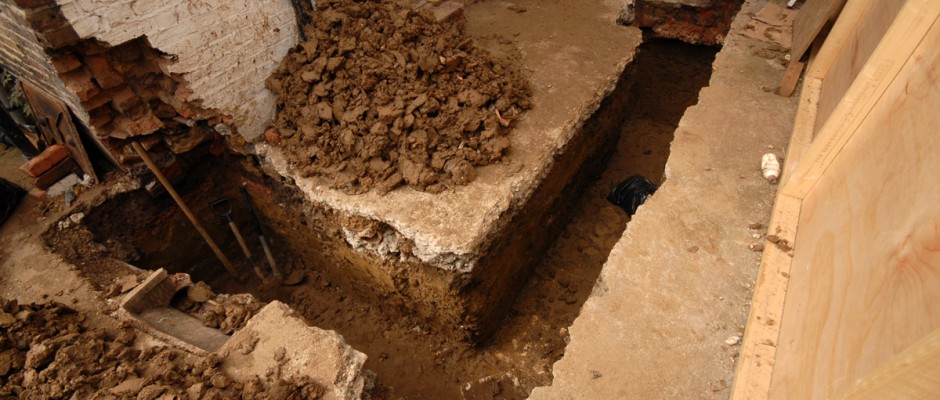 The foundation trench dug by hand