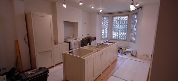 George fits the kitchen in Westcroft Square in Shepherds Bush (Note the wooden flooring has been fitted)
