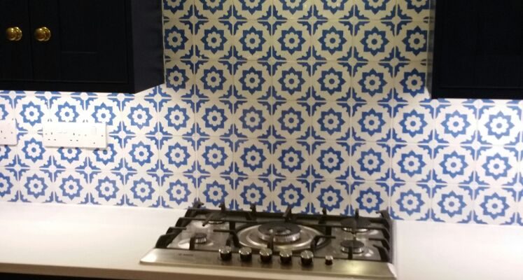 The finished tiles behind the hob