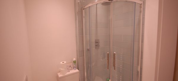 New ensuite shower room with loo and basin in this Colliers Wood house
