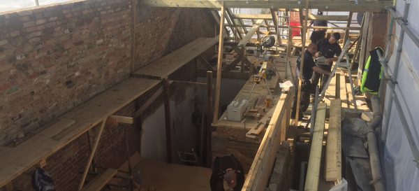 The team are busy building the wooden roof structure on this loft conversion in Fulham. Note the party wall on the left has been built up.