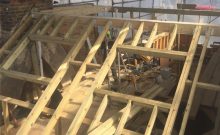 The front roof framework is being built