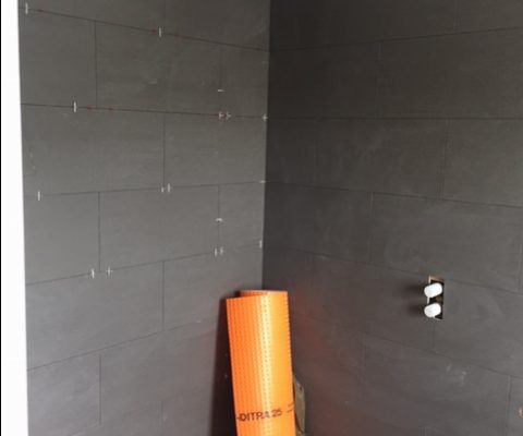 Tiling in the top bathroom on the Kings Road